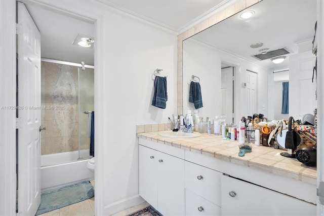 300 Bayview Dr Unit 1503, Sunny Isles Beach, FL 33160 - bathroom with vanity, bath / shower combo with glass door, tile patterned floors, and ornamental molding