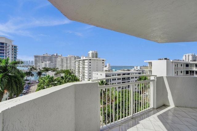 balcony featuring a water view