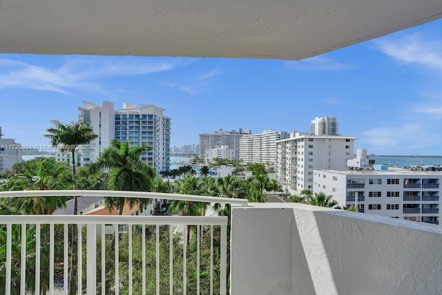 balcony featuring a water view