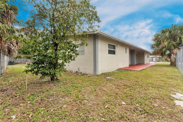 exterior space with a lawn