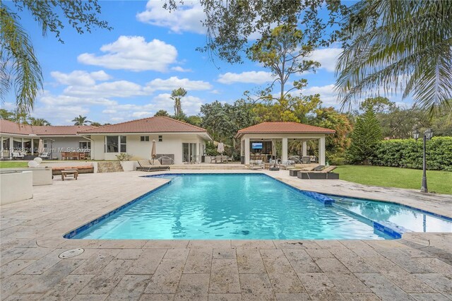 view of pool with a gazebo and a patio