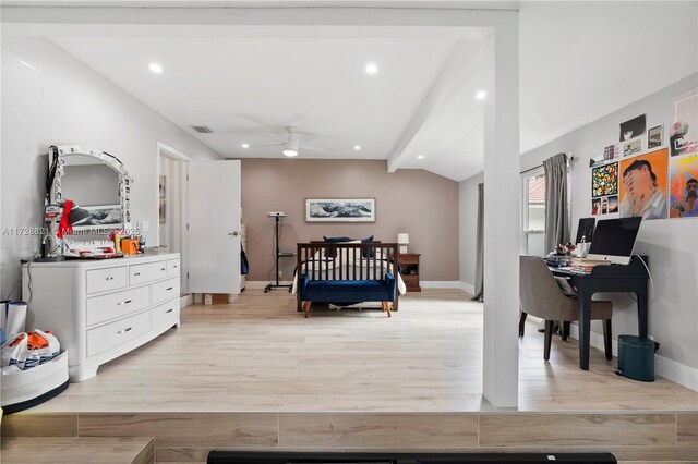 bedroom featuring vaulted ceiling with beams and light hardwood / wood-style flooring