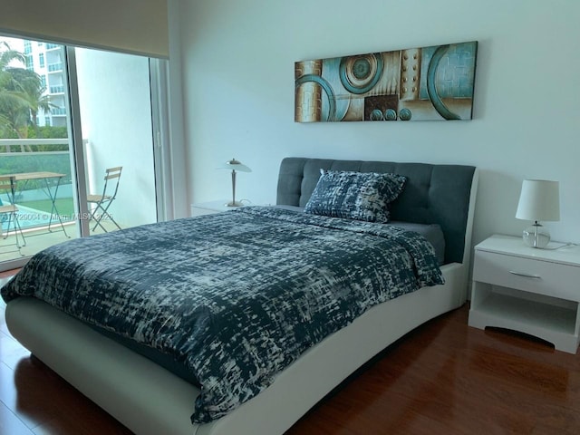 bedroom featuring dark hardwood / wood-style floors