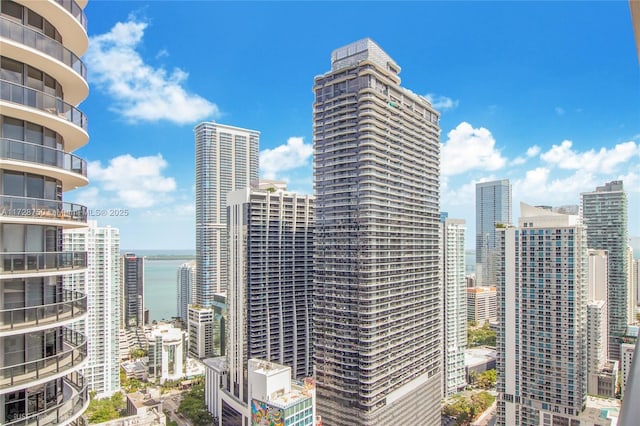 property's view of city with a water view