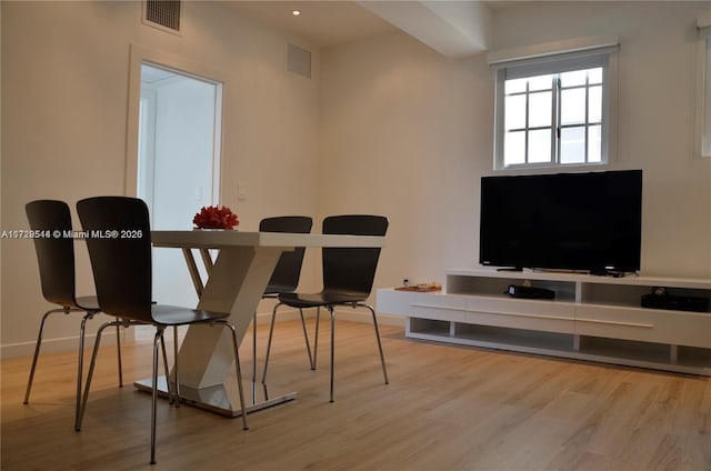 dining room with light wood-type flooring