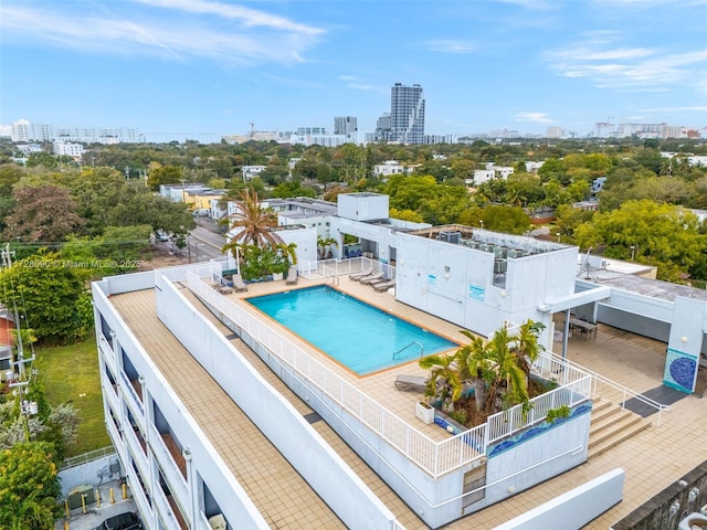 view of swimming pool with a patio