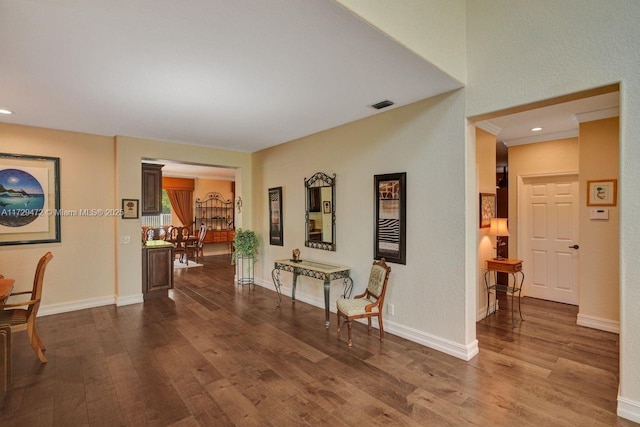 corridor featuring hardwood / wood-style flooring