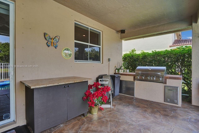 view of patio with area for grilling