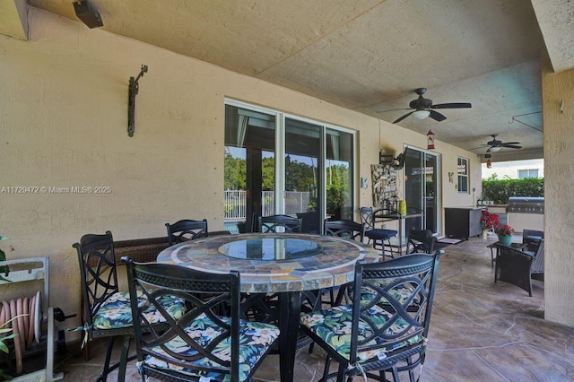 view of patio featuring ceiling fan and area for grilling