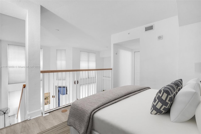 bedroom featuring hardwood / wood-style floors