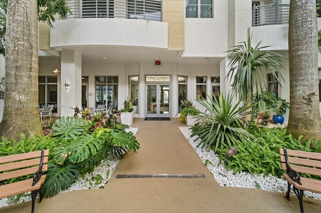 entrance to property featuring french doors