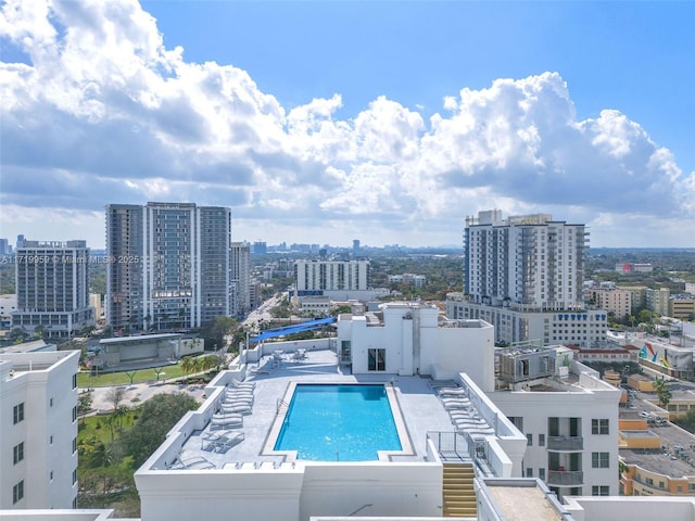 view of swimming pool featuring a patio area