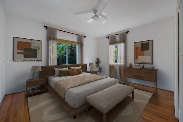 bedroom featuring wood-type flooring and ceiling fan