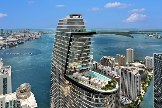 birds eye view of property featuring a water view