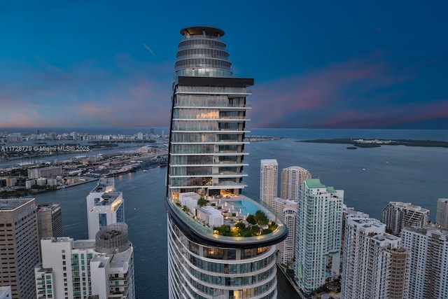 property's view of city featuring a water view