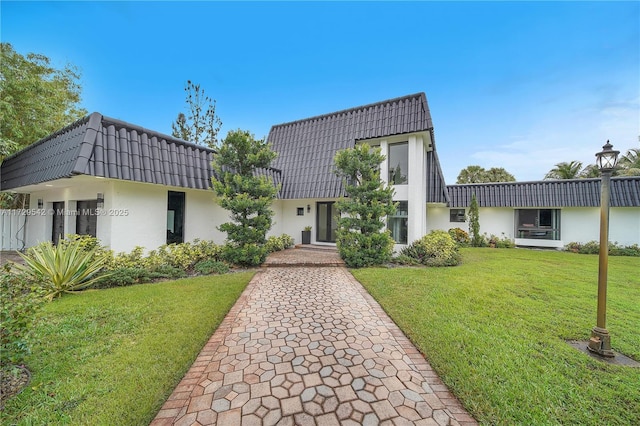 view of front of house with a front lawn