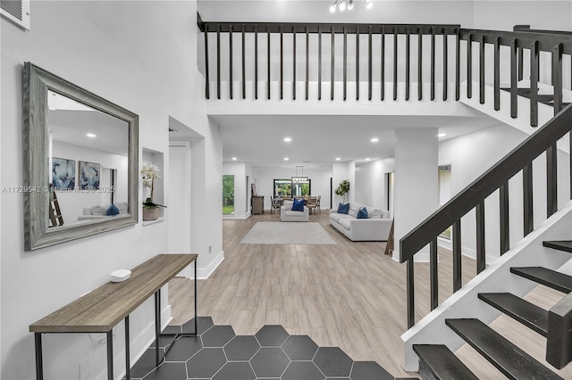 entrance foyer with hardwood / wood-style floors