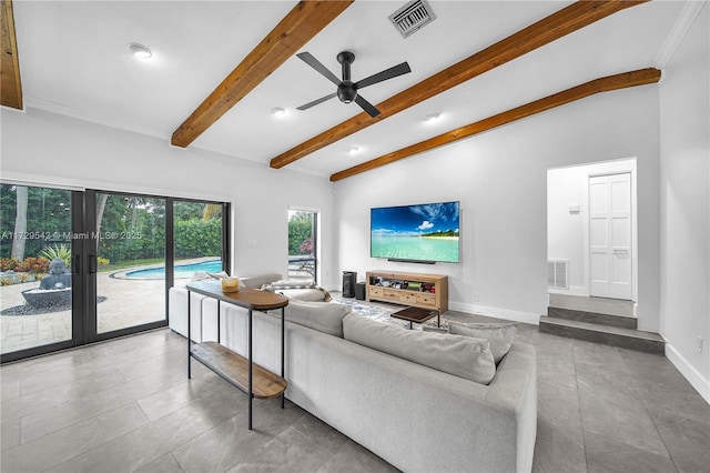 living room featuring ceiling fan and vaulted ceiling with beams