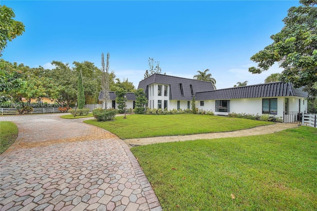 view of front facade with a front lawn