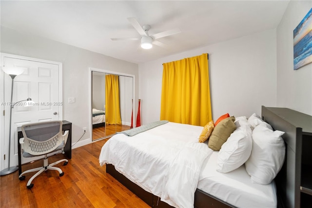 bedroom with visible vents, ceiling fan, and wood finished floors