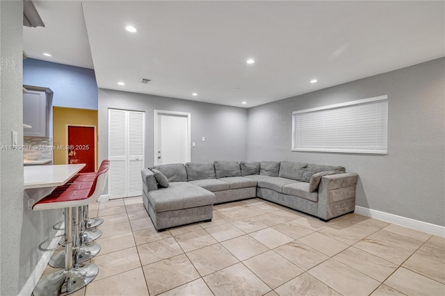 living room featuring light tile patterned floors