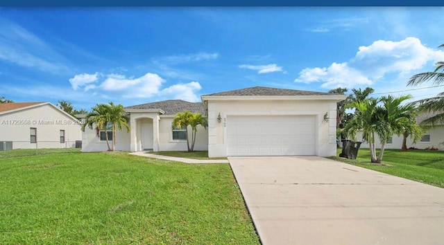 view of front of house with a front lawn and a garage