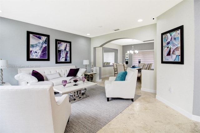 living room featuring a chandelier