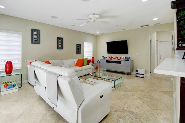 living room with ceiling fan