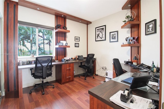 office space with dark hardwood / wood-style flooring