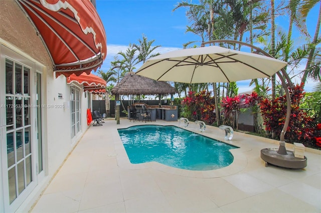 view of pool featuring a patio area and a gazebo