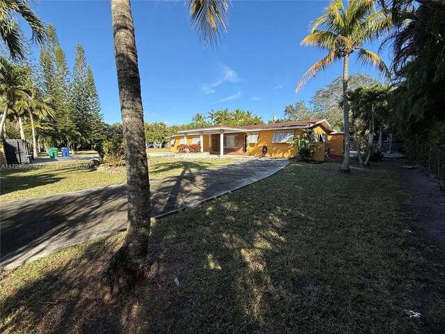11845 SW 97th Ave, Miami, FL 33176 - single story home with a front yard