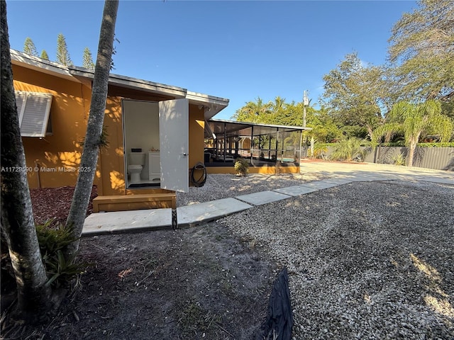 11845 SW 97th Ave, Miami, FL 33176 - view of yard with a sunroom and a patio