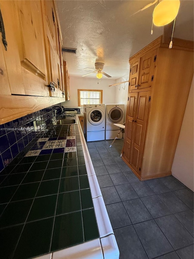 11845 SW 97th Ave, Miami, FL 33176 - clothes washing area featuring ceiling fan, sink, dark tile patterned floors, washer and clothes dryer, and a textured ceiling