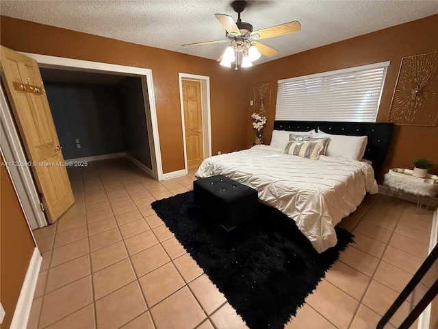 11845 SW 97th Ave, Miami, FL 33176 - bedroom featuring ceiling fan, light tile patterned floors, and a textured ceiling