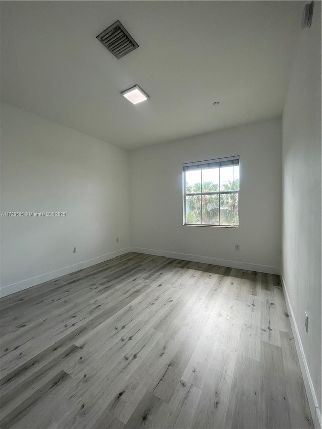 empty room featuring light hardwood / wood-style flooring