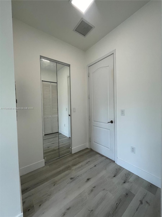 empty room featuring light hardwood / wood-style floors