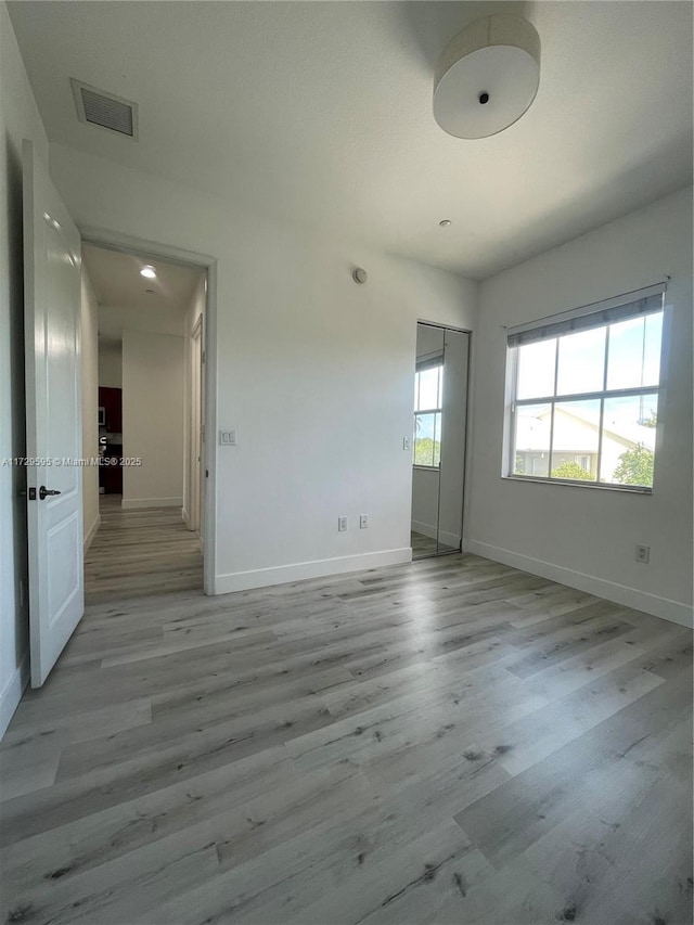 empty room featuring light hardwood / wood-style flooring