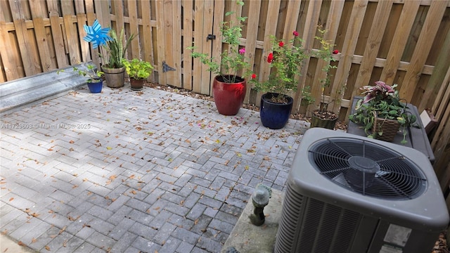 view of patio featuring central air condition unit