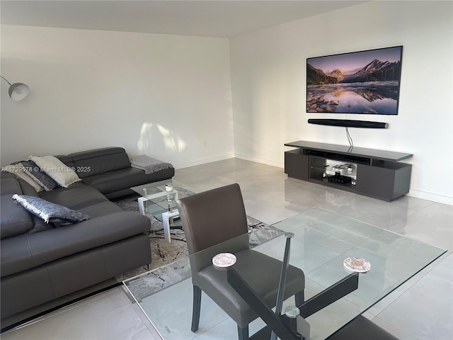 living room with light tile patterned floors