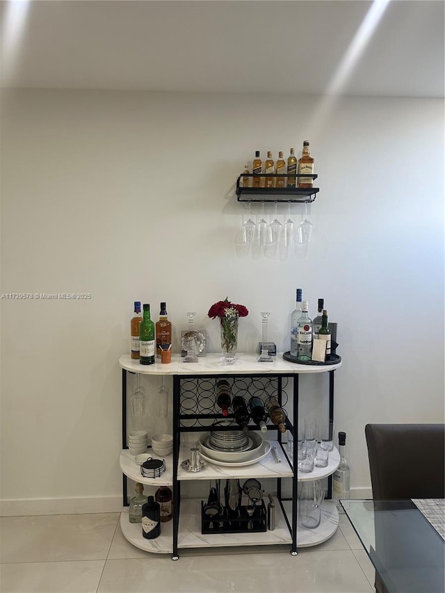 bar featuring tile patterned floors