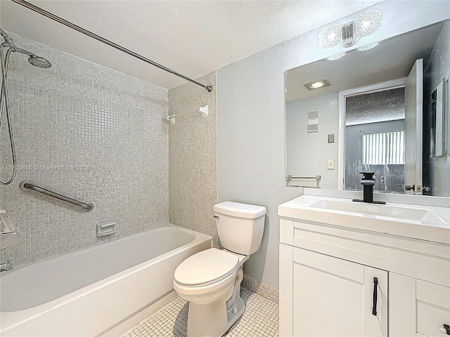 full bath with vanity, bathing tub / shower combination, toilet, and tile patterned floors