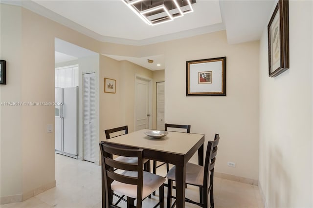 dining room with ornamental molding