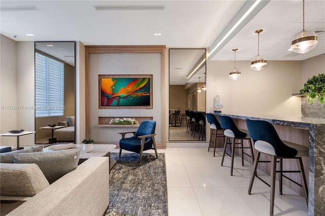 living room featuring light tile patterned floors