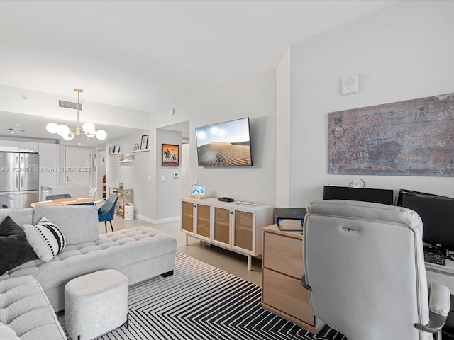 living room featuring a chandelier