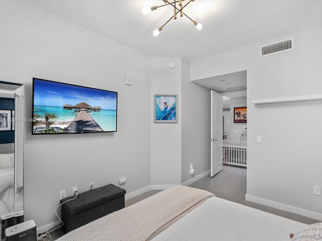 bedroom with a chandelier