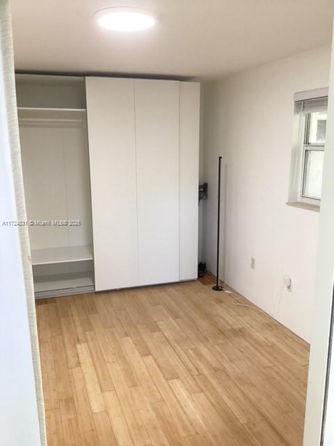 unfurnished bedroom featuring light hardwood / wood-style flooring