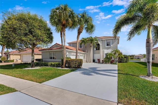 mediterranean / spanish-style house with a front lawn