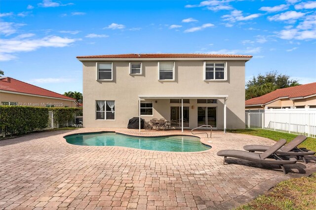 view of pool featuring a patio