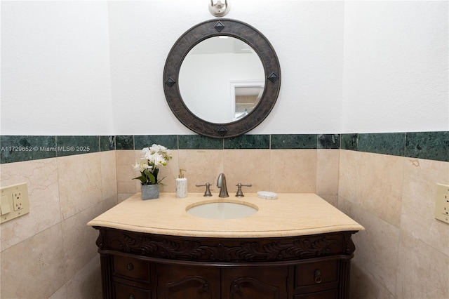 bathroom with tile walls and vanity