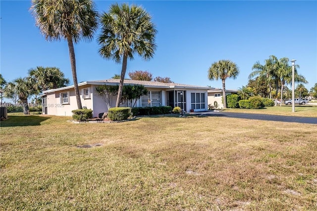 view of front of home with a front lawn